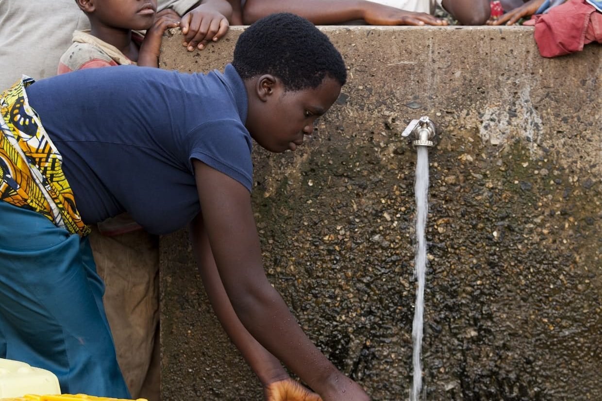 a-moment-of-daily-life-as-children-gather-around-a-2025-04-03-14-40-02-utc